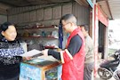 区畜牧局党员开展众创平安志愿服务活动