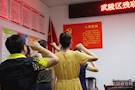 区残联党员志愿者开展社区党建活动庆“七一”